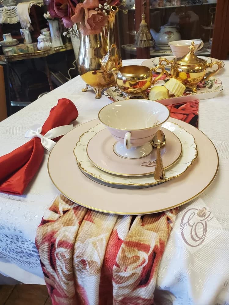 Full Royal Tea spread with three-tier stand and fine china